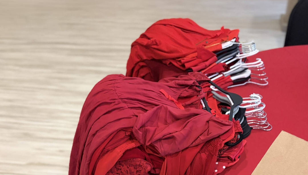 Donated red dresses were used in an installation across campus in support of Red Dress Day.
