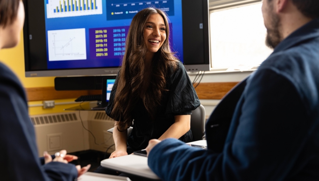 Three students sitting