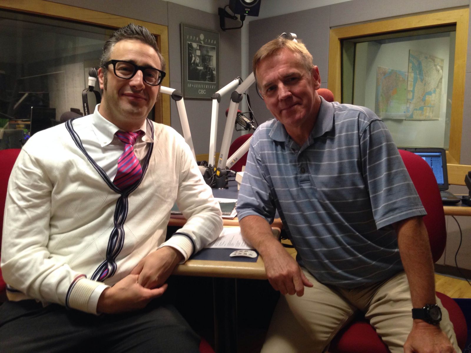 Dr. Pascual-Leone seated with CBC Radio Show host Tony Doucette, for an interview