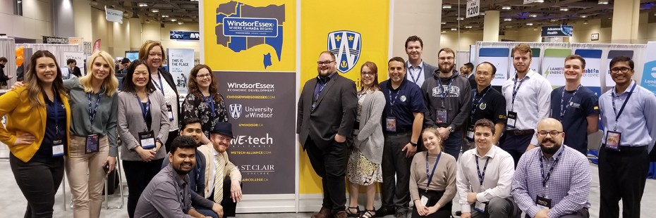group image of University of Windsor Researchers and students at a trade show