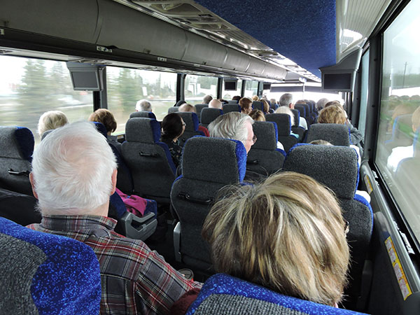 View of people in the bus on the way to Stratford.