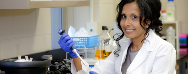 Charu Chandrasekera in lab