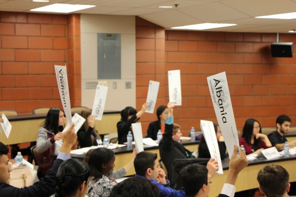 Students during a voting session at the UN simulation conference. 