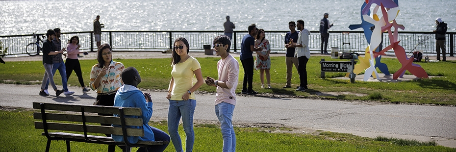 students enjoying riverfront