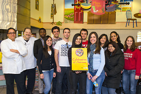 Cooks pose with students