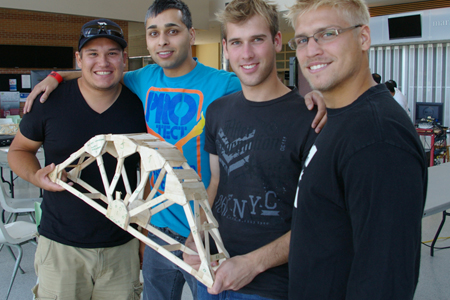 Third-year civil engineering students Josh Mailloux, Ismaeel Babur, Eric Sylvestre and Evan Reidel show off their winning design