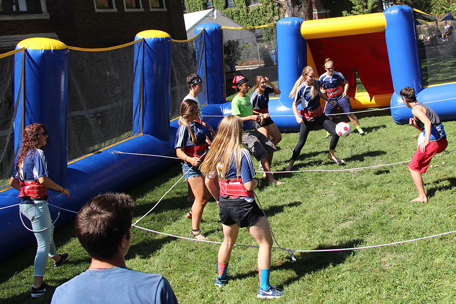 people playing life-size foosball