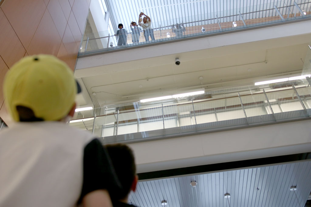 An egg is dropped from the third floor of the Ed Lumley Centre for Engineering Innovation on Wednesday during the Lancer Engineering Camp.