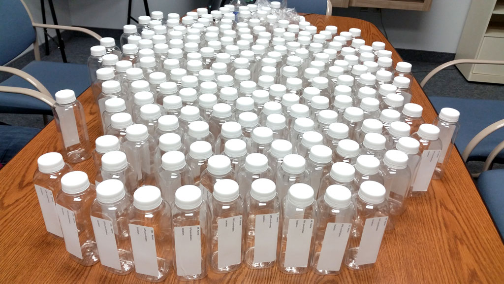 Sample bottles that will be provided to citizen scientists are pictured in this handout photo.