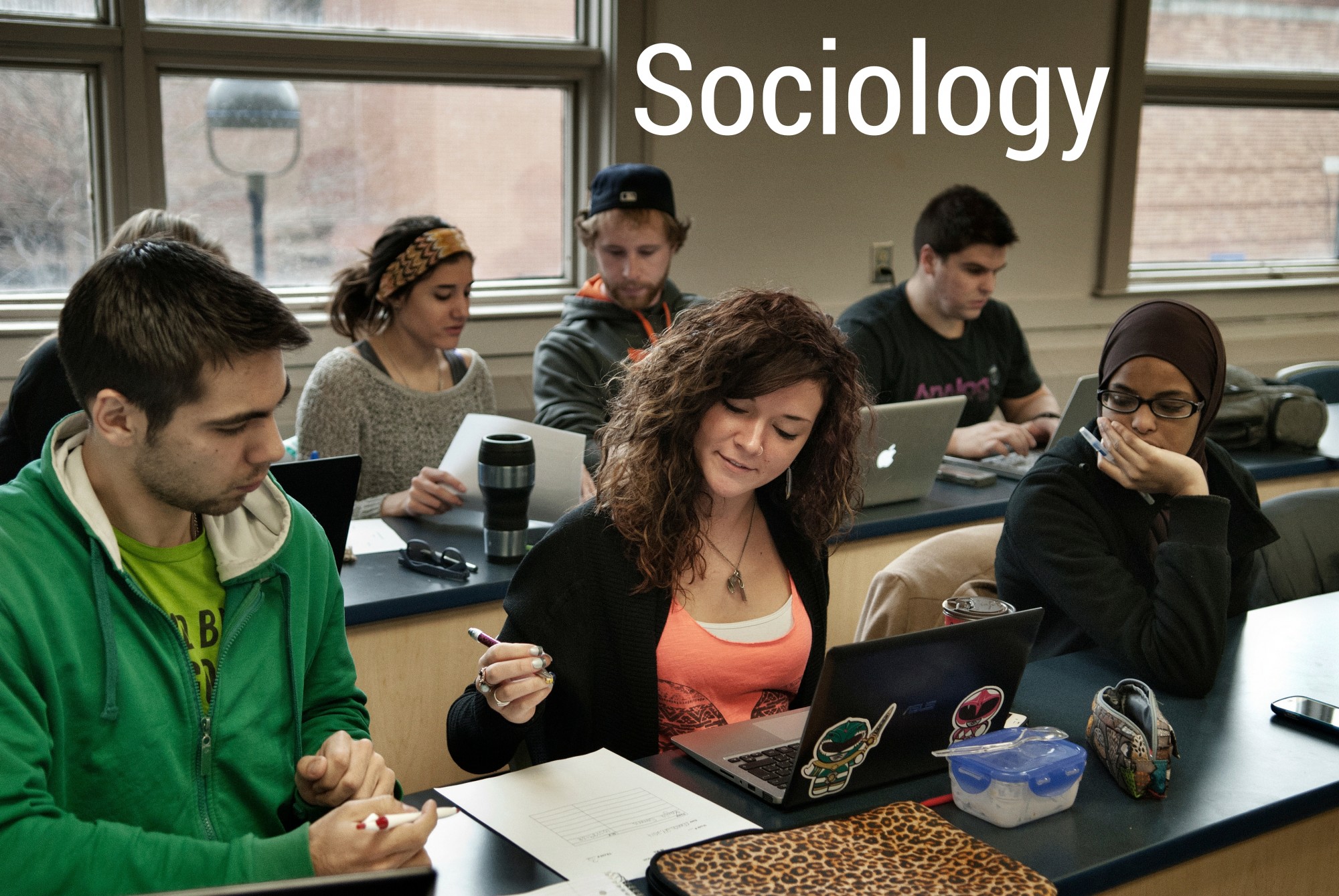 Sociology students in a classroom with Sociology text super-imposed