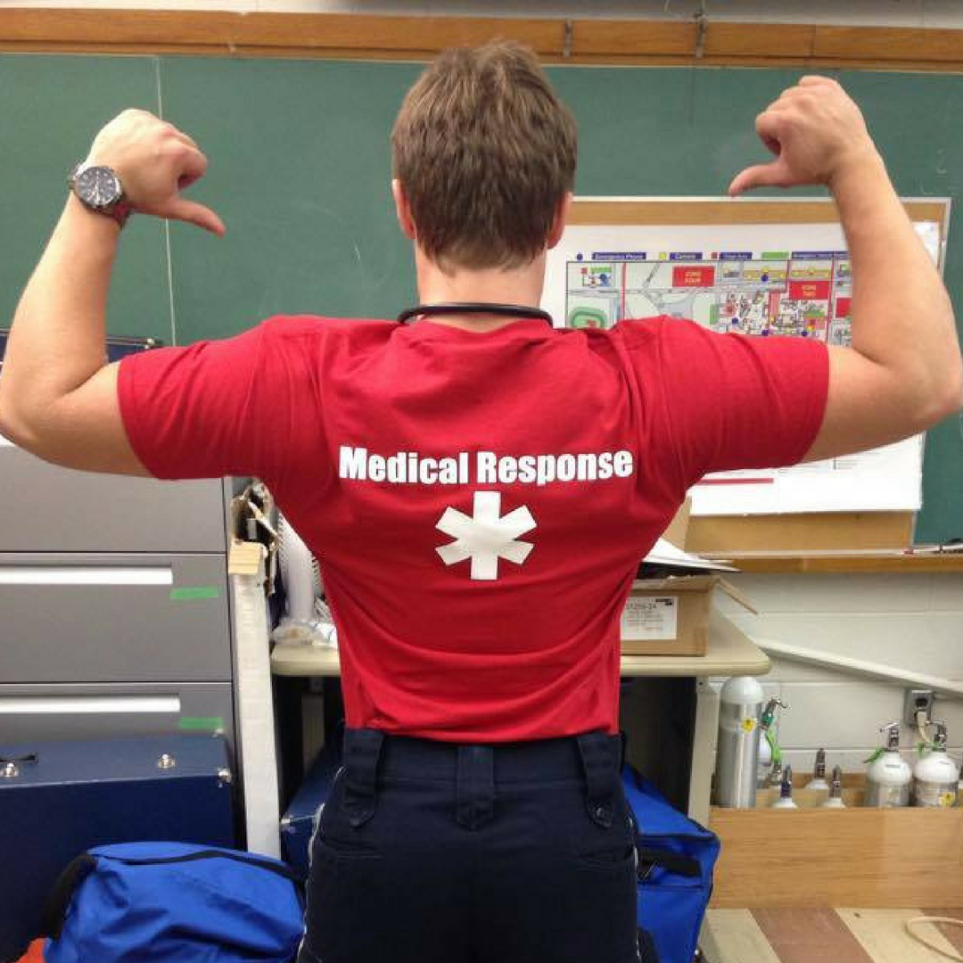 UWSMRS student showing off Medical Response shirt