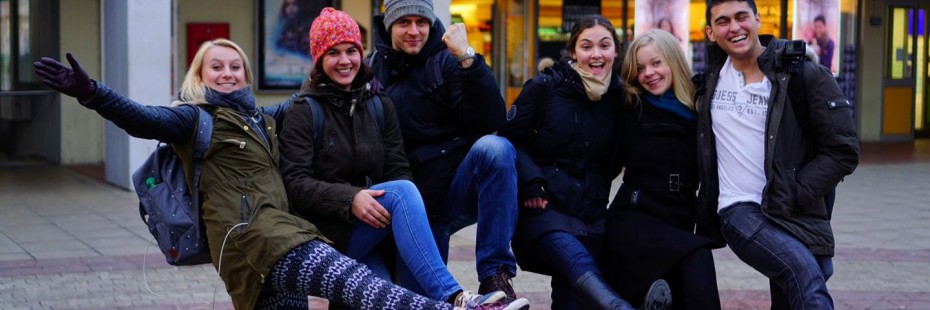 Student posing with group of friends