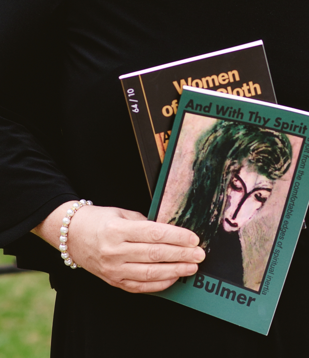 April Bulmer is shown holding two of her published books.