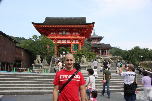 Jake Rybaczuk is shown in front of a temple in Japan.