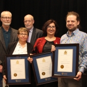 University officials congratulate winners of the UWindsor Award for Excellence in Scholarship, Research, and Creative Activity in the category of Established Scholars and Researchers: (from left) VP research and innovation K.W. Michael Siu, English professor Tom Dilworth, sociology professor Tanya Basok, acting provost Jeff Berryman, law professor Reem Bahdi, biology professor Dan Mennill, and interim president Douglas Kneale.
