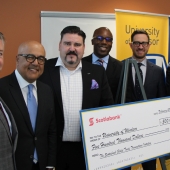 UWindsor interim president Douglas Kneale and Cross-Border Institute director Bill Anderson flank Scotiabank officials Alex Besharat, senior vice-president and head of Canadian wealth management; Terry Roman, director and market lead of commercial banking; Charles Achampong, director of academic partnership engagement and sponsorship philanthropy; and Sean White, ScotiaMcLeod branch manager, director and wealth advisor.