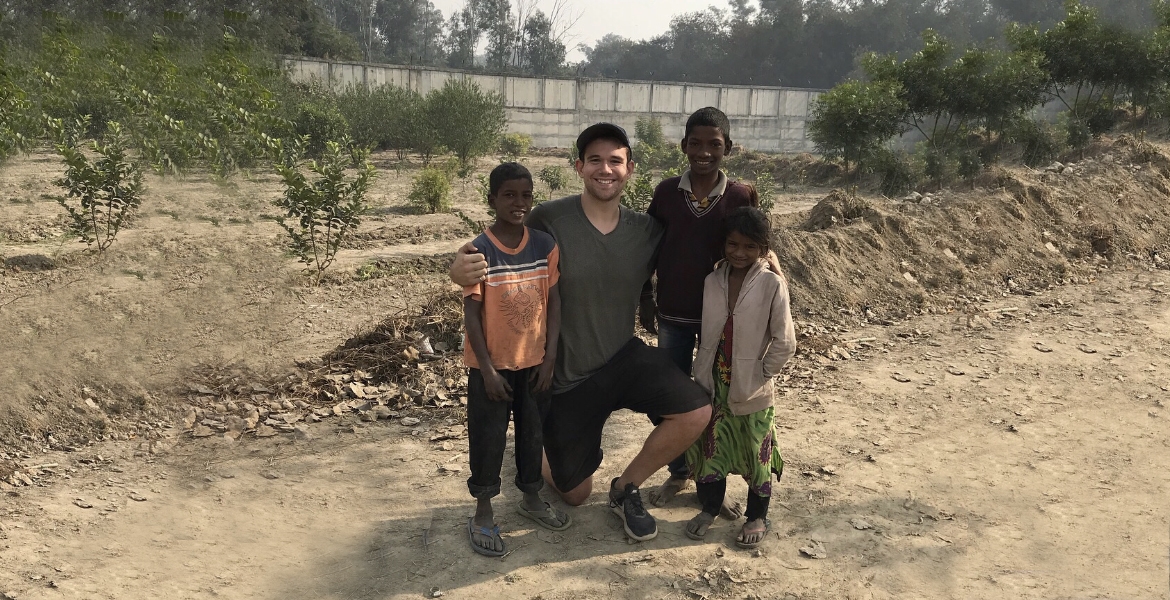 UWindsor student Dylan Verburg was often greeted by youngsters Kishan, Guddu, and Maya during his trips to a lake outside the Indian capital city of New Delhi, where he was conducting his master’s research on water quality.