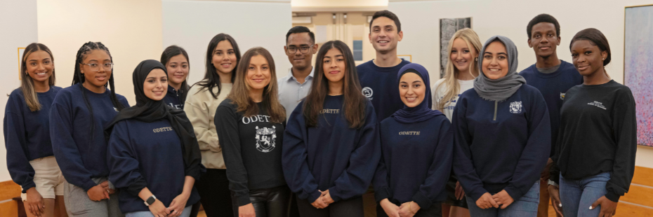 Group of students wearing Odette shirts