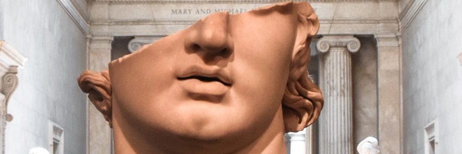 A half-destroyed head of a marble statue.