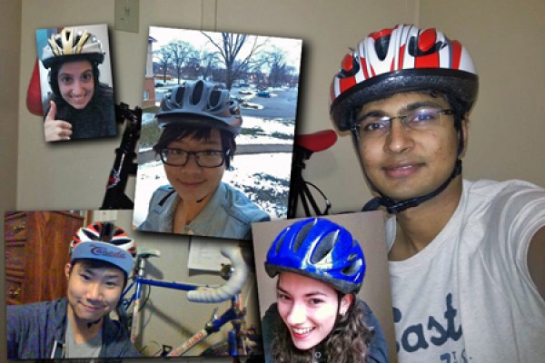 self-portraits of students wearing bike helmets