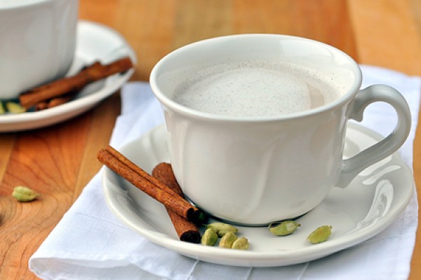 Chai tea with cardamom pods and cinamon stick