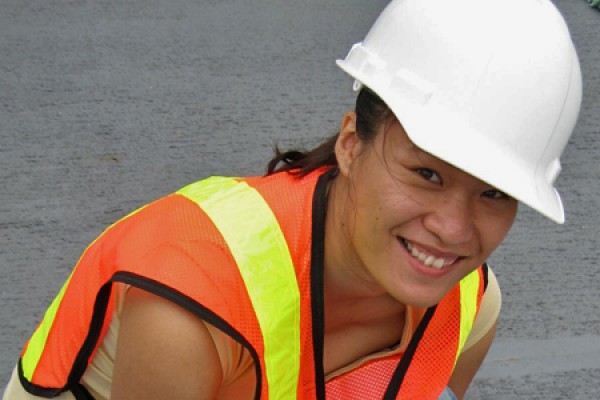 Farrah Chan conducts fieldwork for her study of aquatic invasive species.