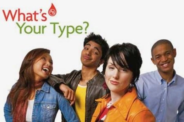 blood donors with sign: &quot;What&#039;s your type?&quot;