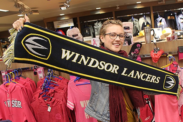 Alexandra Biniarz models a warm fringed Windsor Lancers scarf