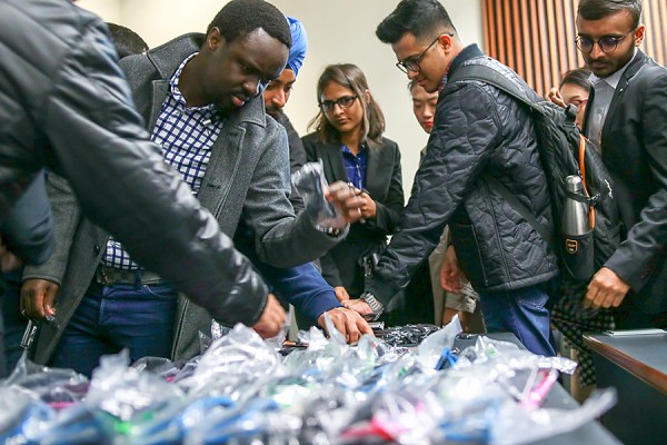 Students eagerly accept swag from BlackBerry.