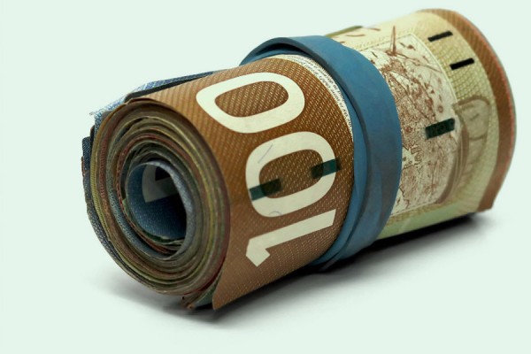 roll of hundred-dollar bills
