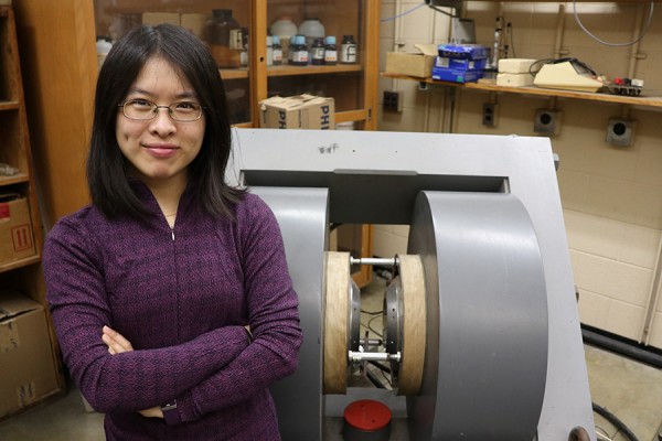 Physics professor Dan Xiao is experimenting with an electromagnet to develop a portable Magnetic Resonance device.