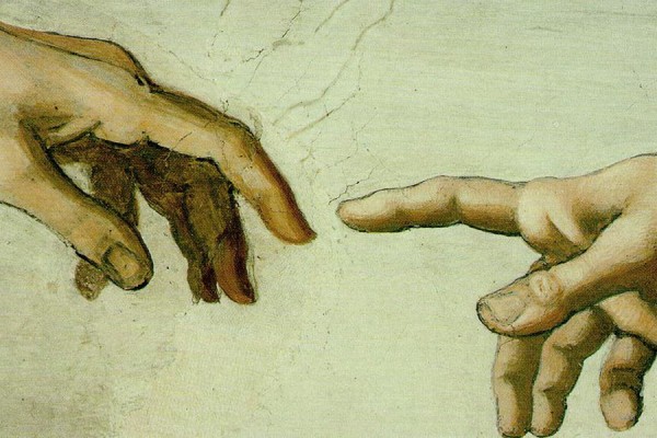 close-up of hands from Michaelangelo&#039;s Creation of Adam