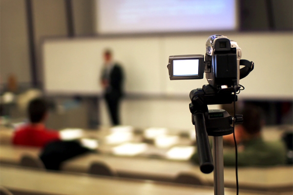 video camera recording classroom lecture
