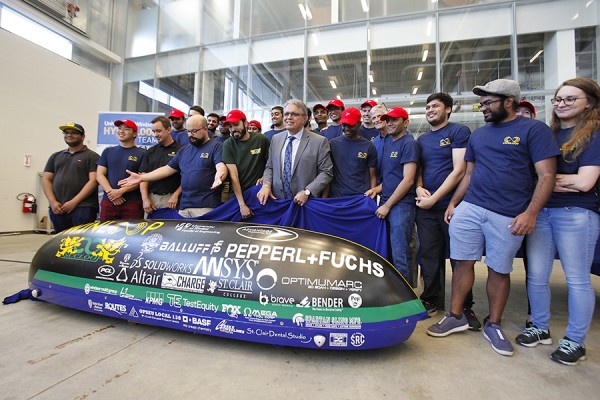 University officials and team members unveil Windsor’s entry in the SpaceX Hyperloop Pod Competition.