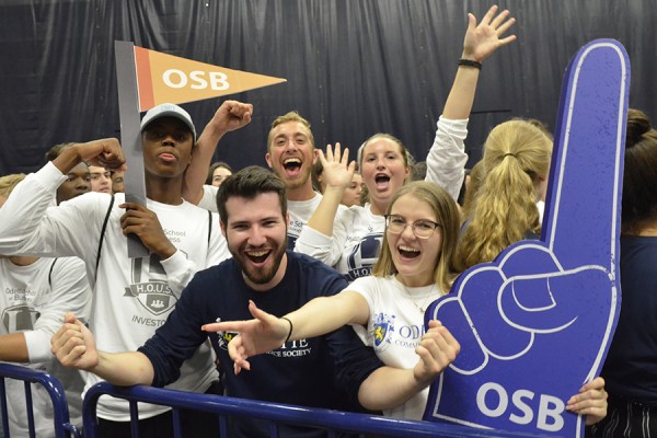 Representatives of the Odette School of Business cheer at an assembly welcoming first-year students to the University of Windsor, Wednesday in the Dennis Fairall Fieldhouse.