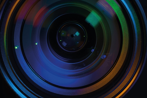 video camera lens, an image from the cover of The Routledge Companion to History and the Moving Image