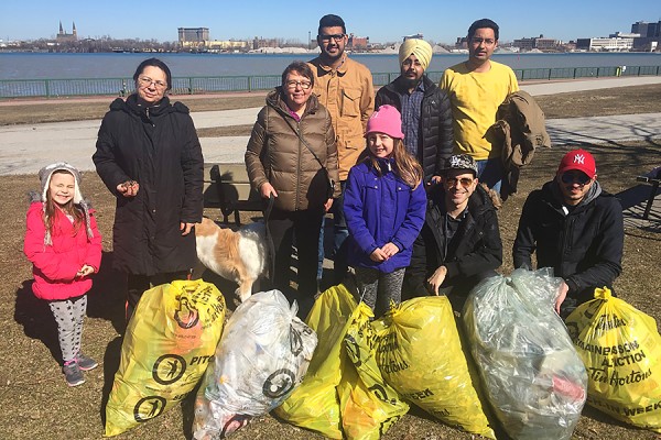 Volunteers collected bags of trash during last year&#039;s clean-up along the Detroit River.