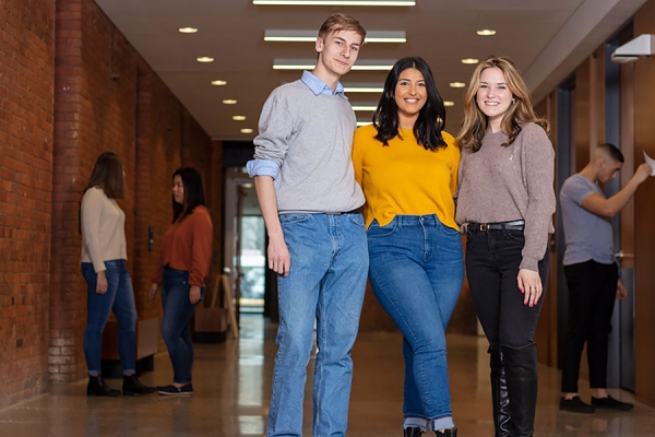 students standing in hallway