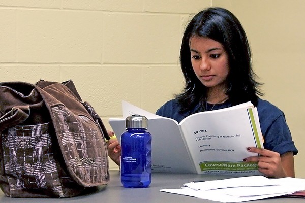 student hitting the books