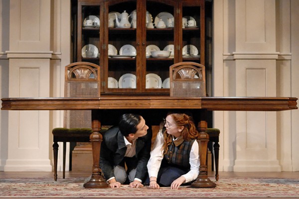 two actors under table