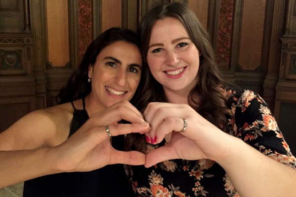 UWindsor environmental engineering MASc students Rania Toufeili and Chrissy Ure show off their iron rings after graduation. Both were offered scholarships by the Ontario Society of Professional Engineers.