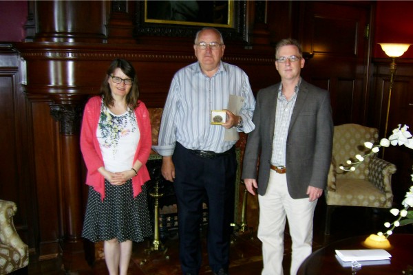 Local historian Arthur Jahns (centre) who received the 2015 UWindsor History Department Community Heritage Medal, accepted congratulations from the History Department professors’ Miriam Wright (l.) and Steven Palmer (r.).