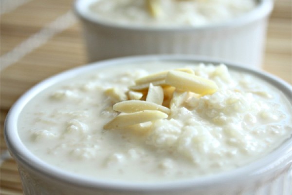 kheer in a bowl topped with pistachios