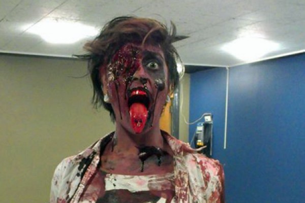Residence assistant Komal Kundhal practices her zombie act 