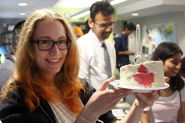 Claire Anderson holds aloft ice cream with a red maple-leaf centre.
