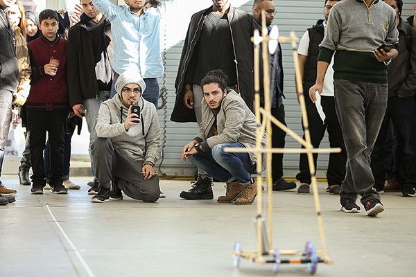 students racing vehicles