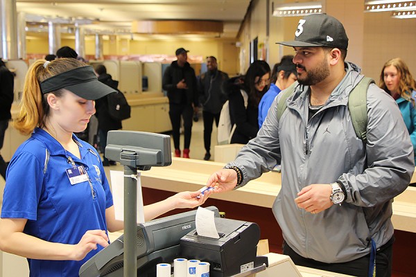 cashier serving student in Marketplace