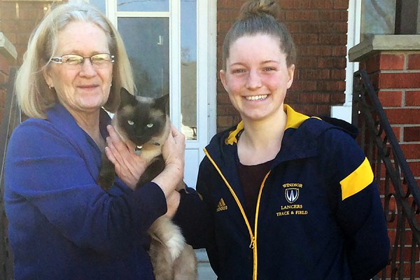 Marion Melville, her cat Rescue, student Charlene Rhead