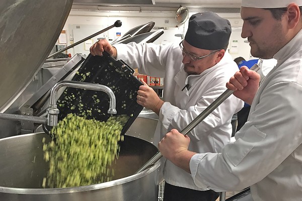 Chefs prepare a big batch of the famous Food Services vegetarian chili.