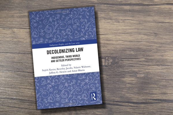 book cover of Decolonizing Law